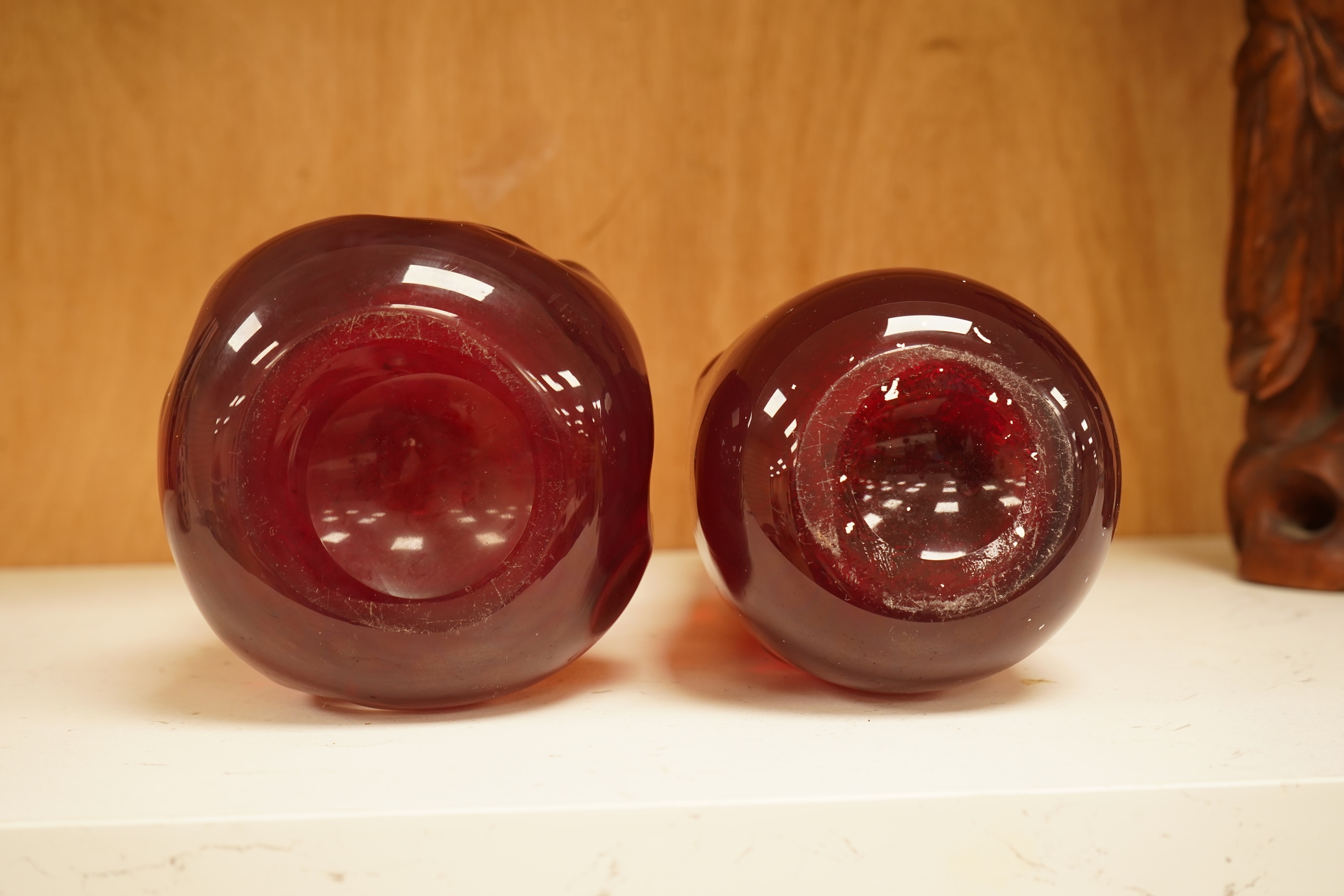 Two Whitefriars ruby red ‘knobbly’ glass vases, tallest 25cm